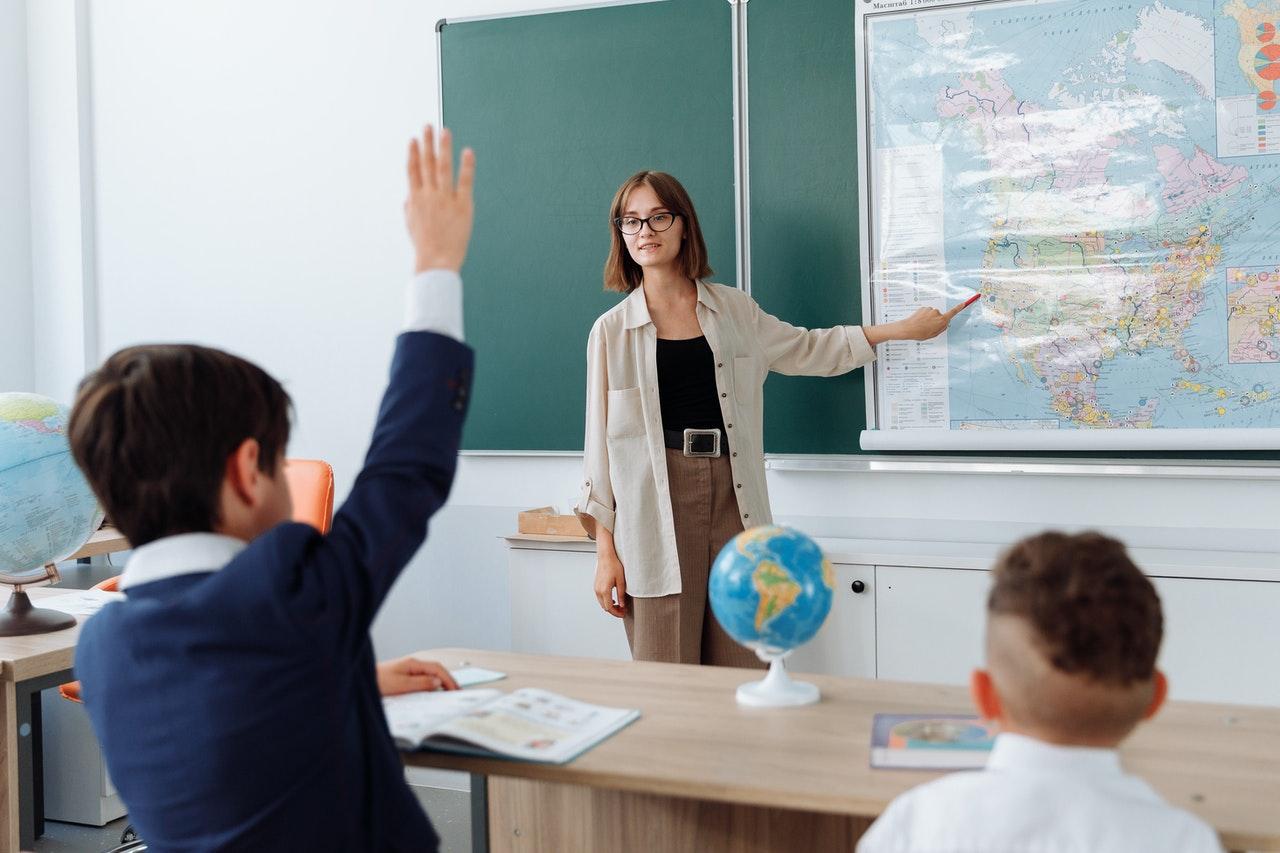 Children in classroom and teacher