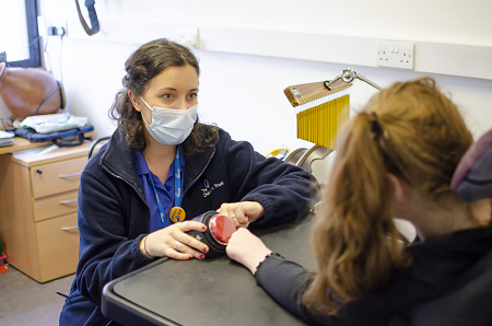 Sophie in a music therapy session with a young person