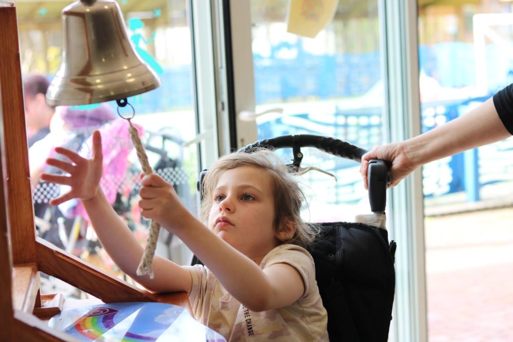 Lois ringing the bell