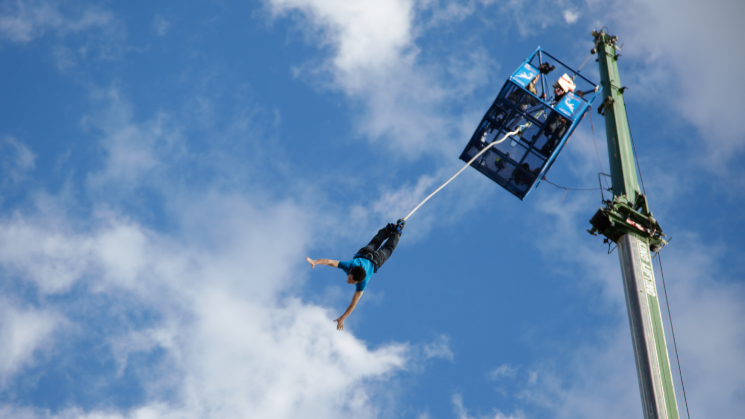 A bungee jumper jumping off Tower Bridge