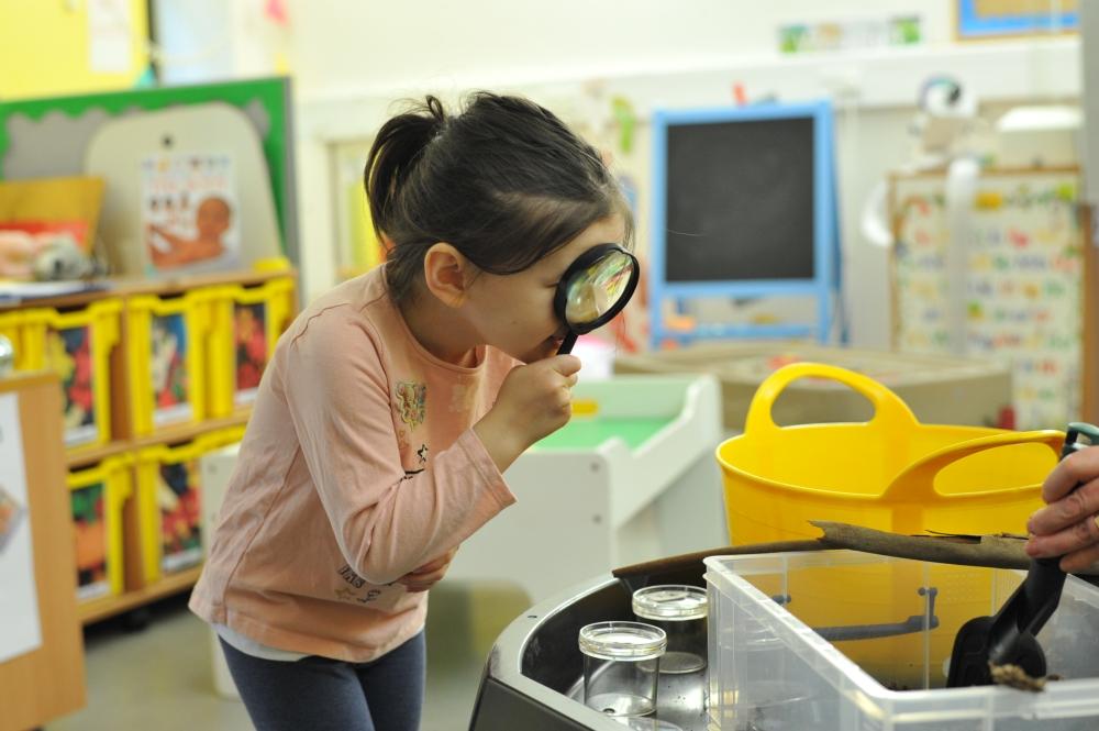 Mia at a speech therapy play session