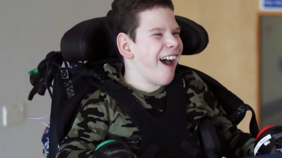 William laughing whilst using a switch