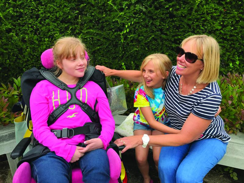 Emily and family at The Children's Trust