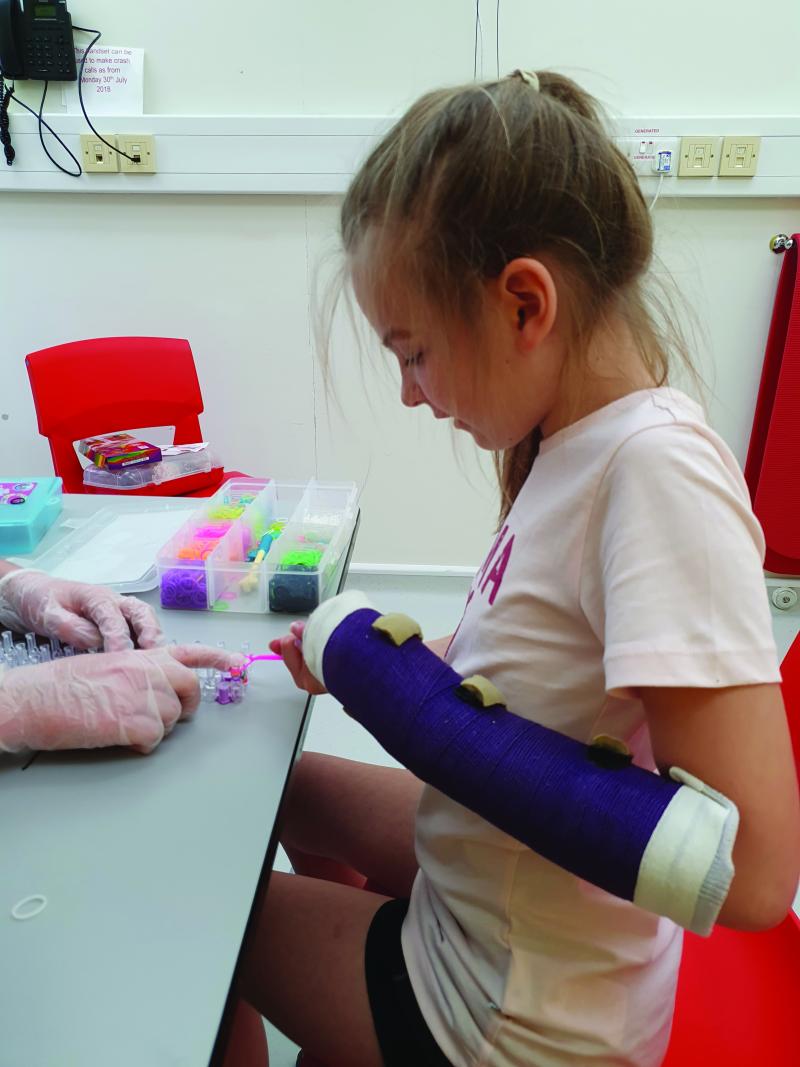 Lily in an OT session