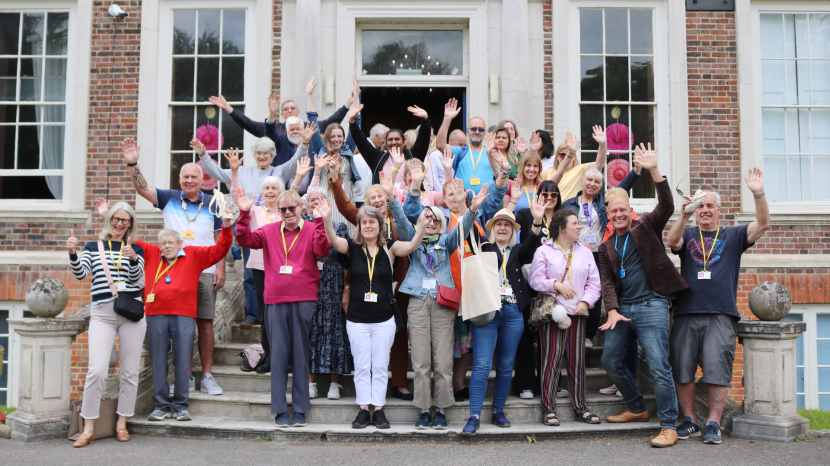 Volunteers gathered together outside the mansion at Tadworth Court.