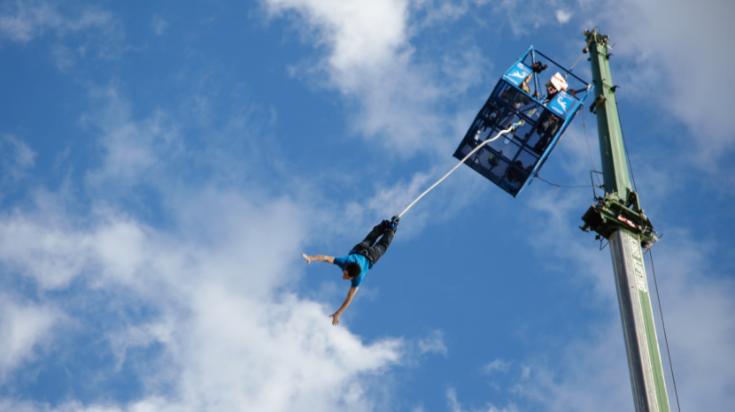 A bungee jumper jumping off Tower Bridge