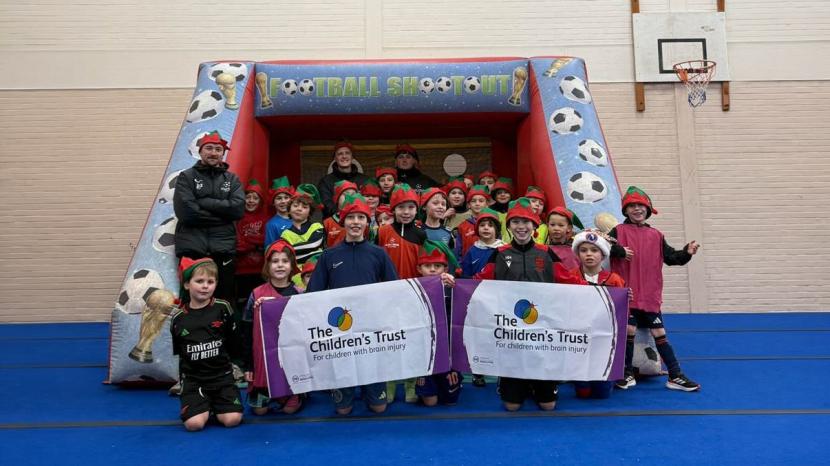 Children taking part in an Elf Fun penalty shootout