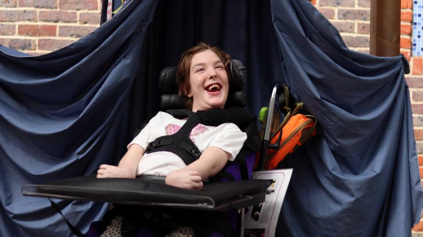 school pupil smiling at camera