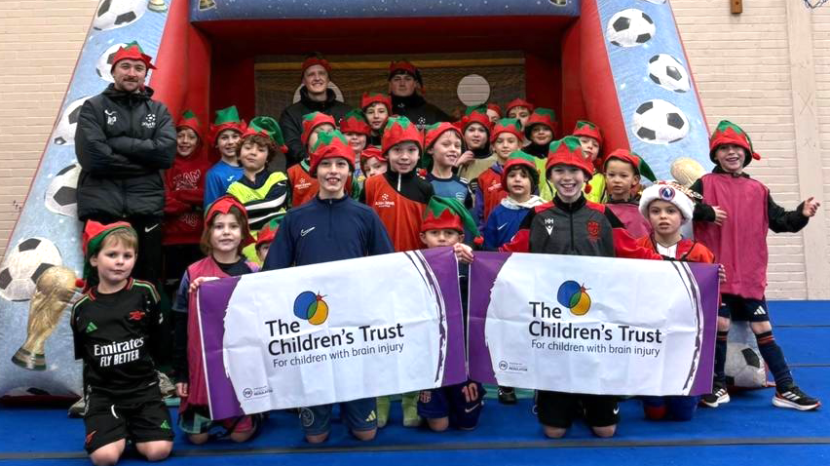 Children taking part in an Elf Fun penalty shootout