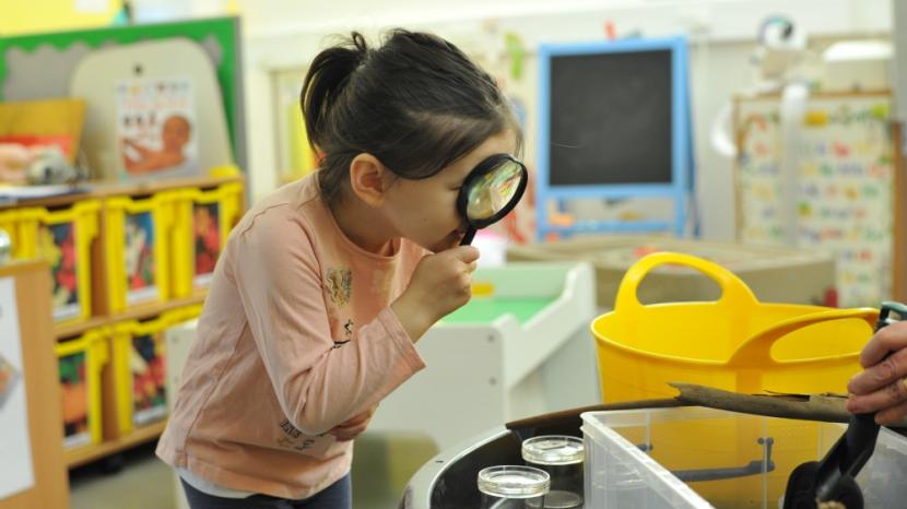 Mia at a speech therapy play session