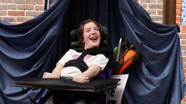 school pupil smiling at camera